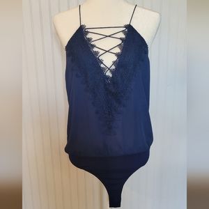 WAYF navy blue spaghetti strap bodysuit with a lace up front. Size medium
